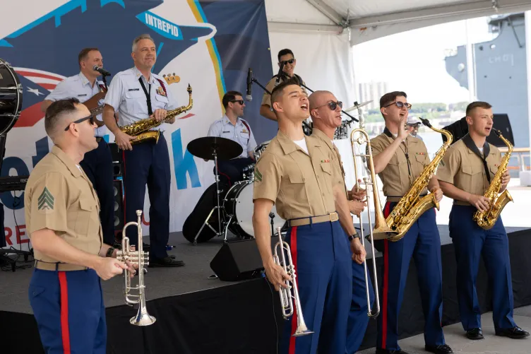 A military band performing on Pier 86 during Fleet Week.